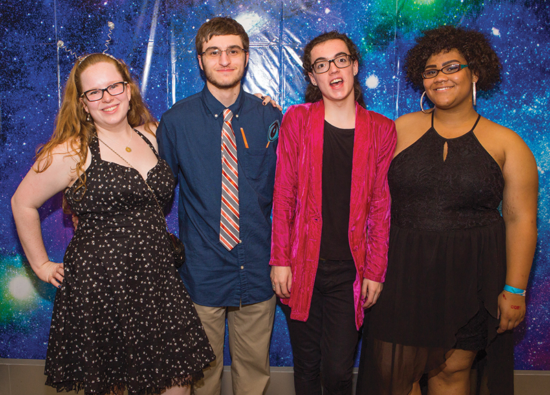 4 teens posing at LGBTQ prom