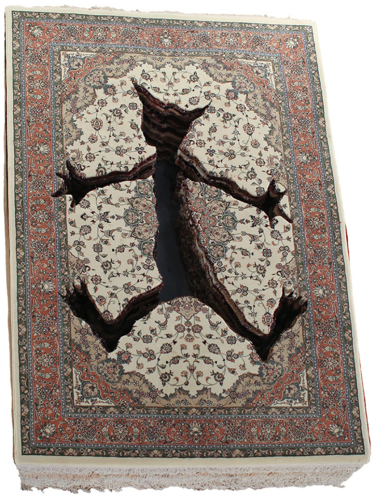 A large stack of Persian carpets with a cartoon-like figure cut out of the middle of it.