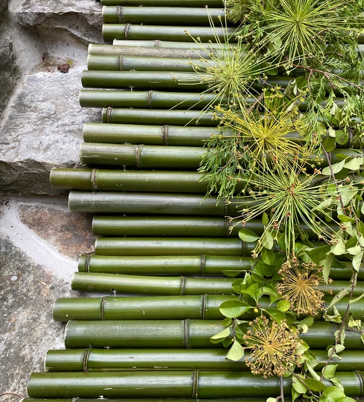 A stack of bamboo on steps