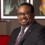 Headshot of Marcus Hartshaw