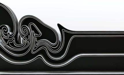 A black and silver abstract-shaped bookcase