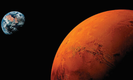 Mars with Earth in the background.