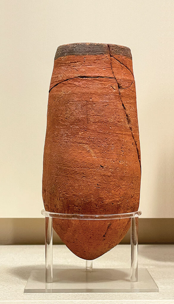 An ancient Egyptian beer mug made of clay.