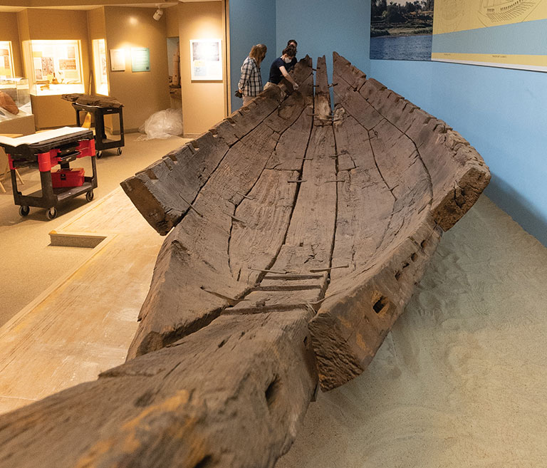 A large wooden boat from ancient Egypt.