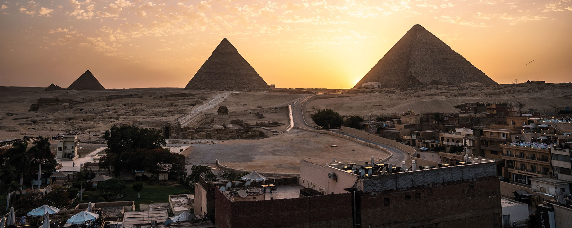 A view of the pyramids from the rooftop of a building in Giza.