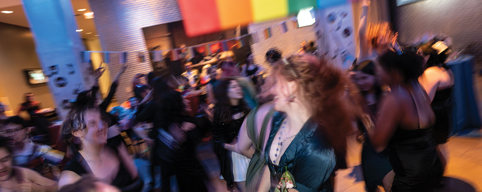 Teens dancing at the LGBTQ prom at the Warhol Museum.