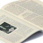Open magazine displaying an article titled "Mimicry in Nature" with a small black-and-white photo of a man. Dense text fills both pages, conveying an academic tone.
