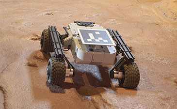 Six-wheeled planetary rover with a boxy scientific payload drives across reddish, rocky terrain, evoking exploration on Mars.