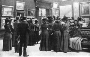 Old photo of a group of people at The first Carnegie International, 1896.