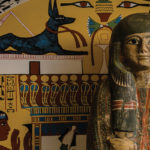 A view of an egyptian mummy in an exhibit.