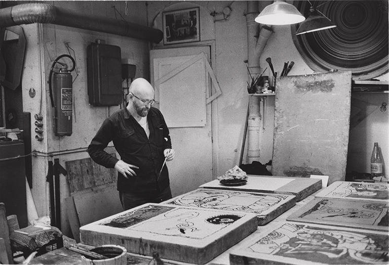 Black and white photograph of Pierre Alechinsky at work.