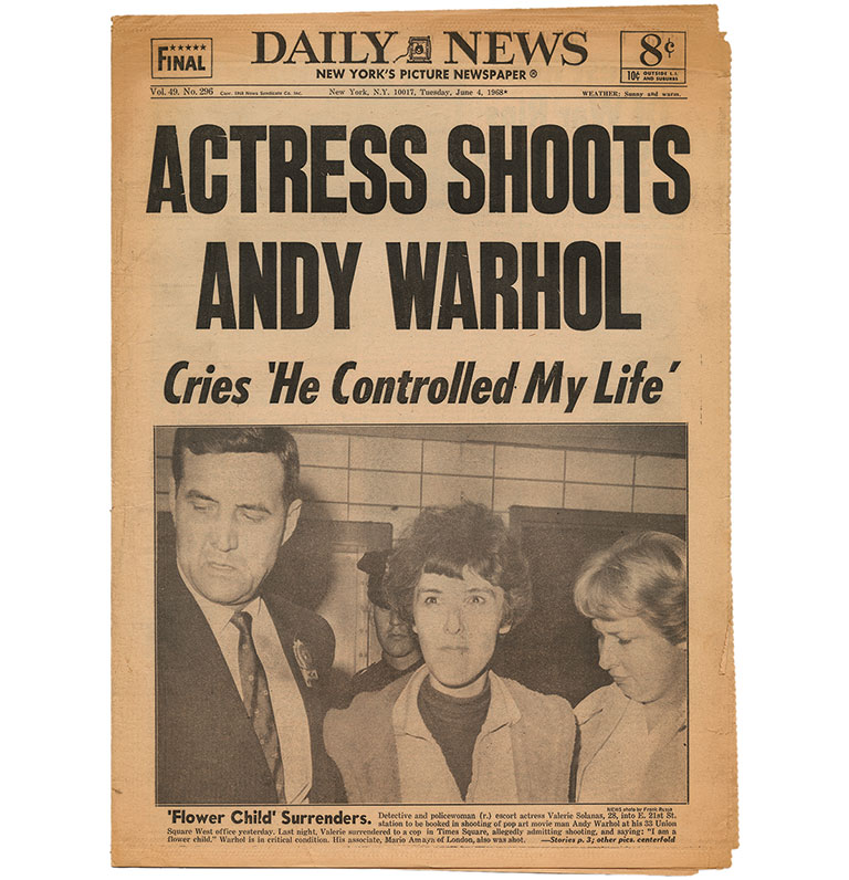 An old newspaper with a headline reading, Actress Shoots Andy Warhol