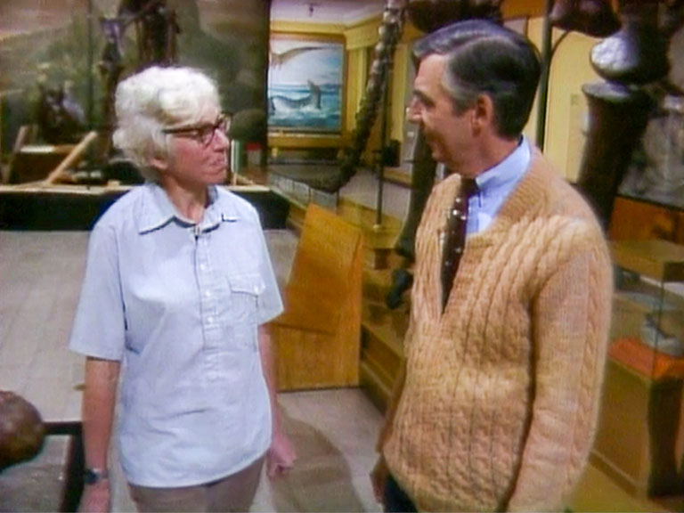 Mary Dawson talking to Fred Rogers in the museum.