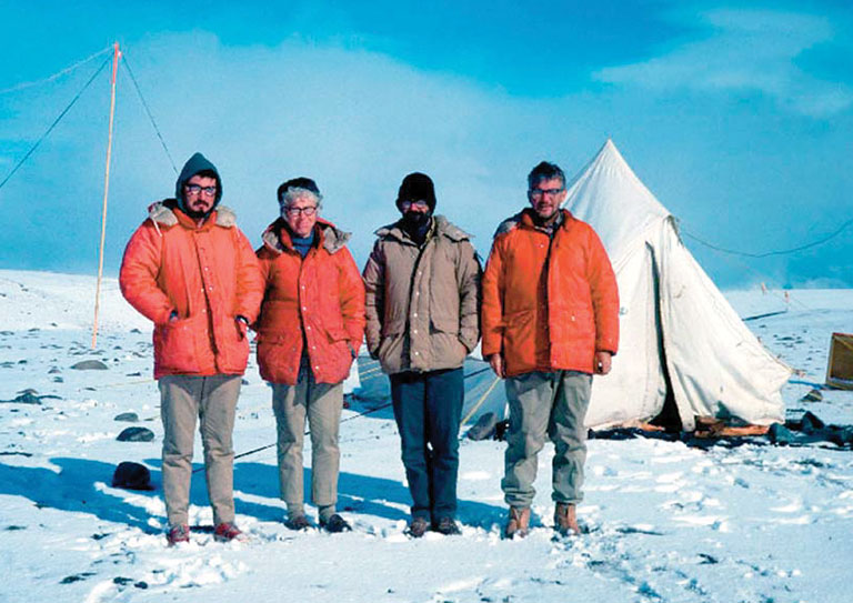 MAry Dawson with team members in a camp in the arctic