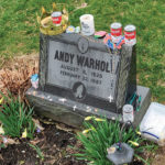 Andy Warhol's gravesite, with Campbell soup cans left on top.