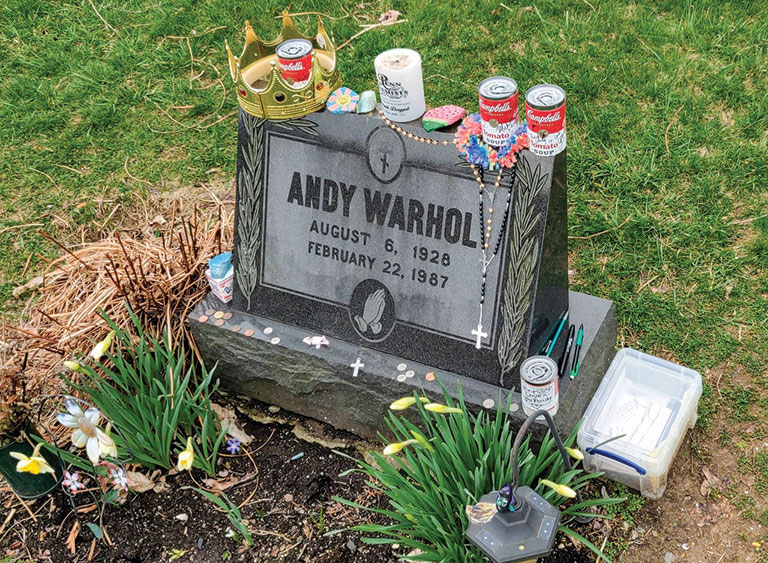 Andy Warhol's gravesite, with Campbell soup cans left on top.