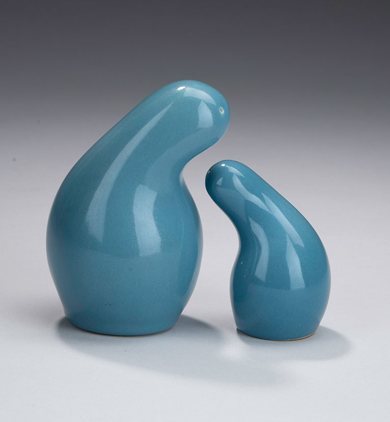 A set of blue organic shaped salt and pepper shakers