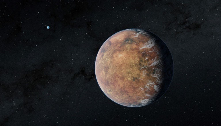 A view of a large brown planet in space