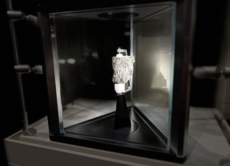 An exhibition view of a moon rock