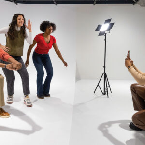 A group of teens posing for a tik-tok video