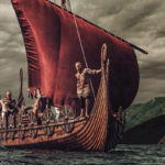 Illustration of a viking ship with viking warriors aboard