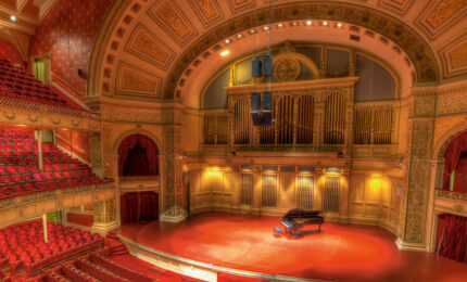 A panoramic beautiful photo of the Carnegie Music Hall.