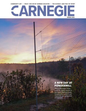 Cover of Carnegie Magazine, Spring 2026. Features a serene sunrise over a misty landscape with trees and a net fence. Text: "A New Day at Powdermill."
