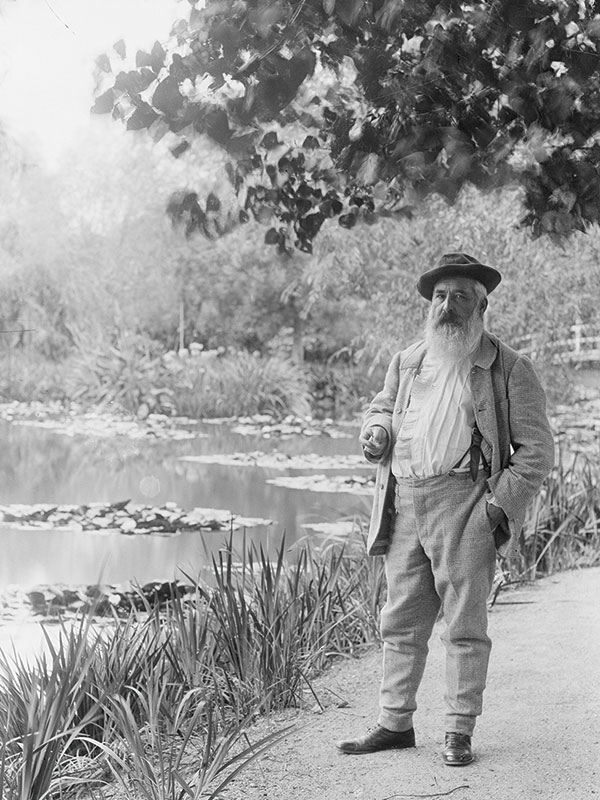 A black and white photo of Claude Monet