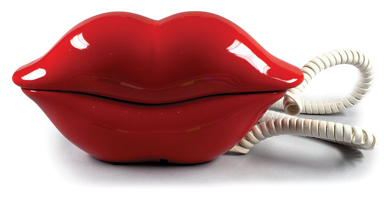 A telephone in the shape of a large pair of red lips.