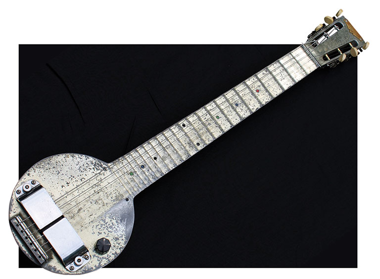 A vintage electric guitar made from aluminum.