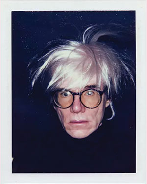 A polaroid portrait of Andy Warhol