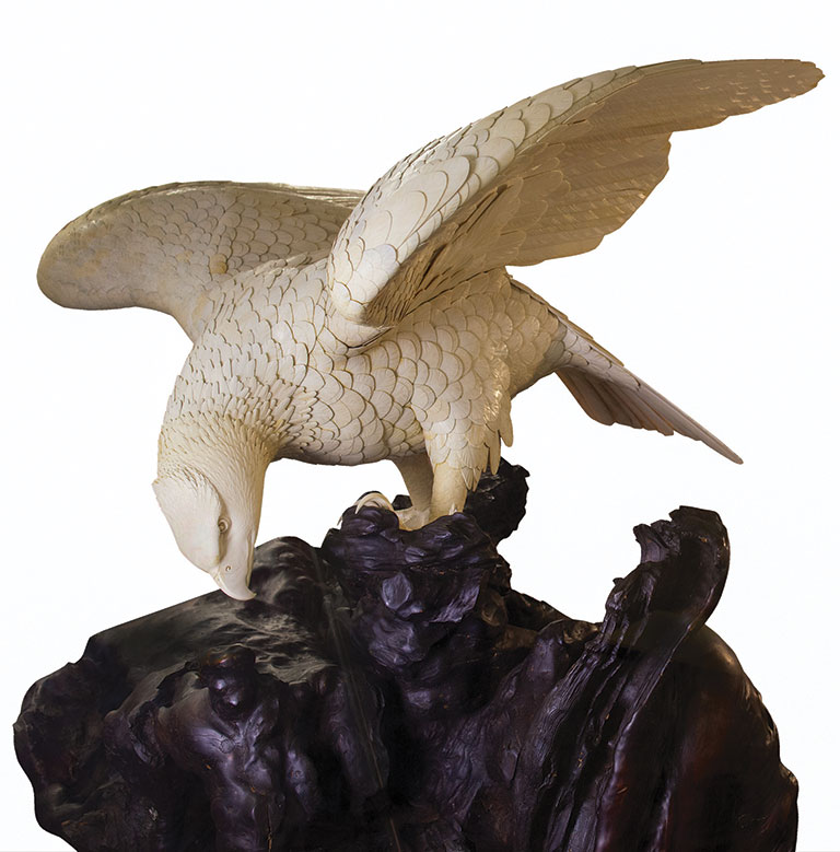 A large eagle carved out of ivory.