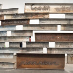 An installation view of artwork made of steel beams.