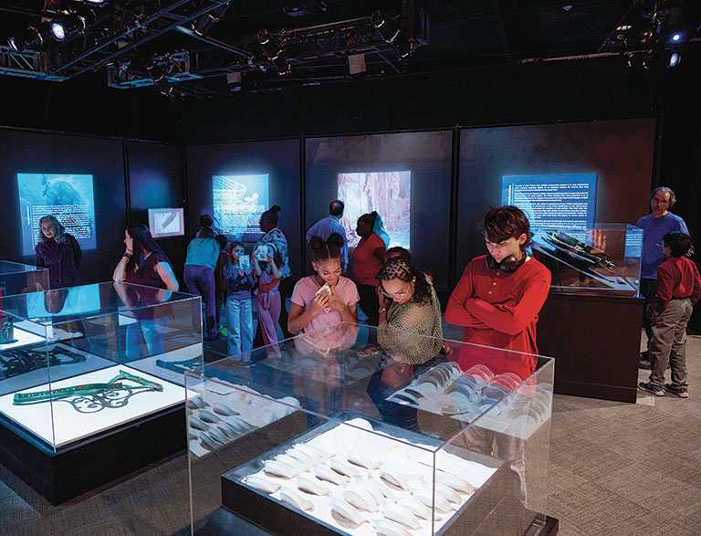 A group of people in the Titanic exhibition.