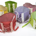 A grouping of very colorful girdles.