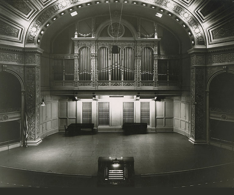 An early view of the Carnegie Music Hall stage featuring the pipe organ