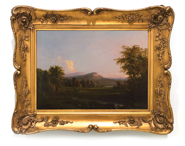 A framed landscape painting