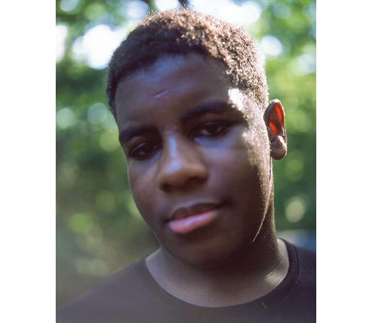 A portrait of a young African-American teen.