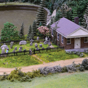 A miniature model of a graveyard and chapel