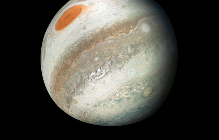 A photo of Jupiter showing it's great red spot.